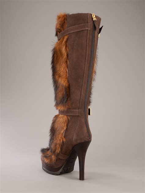 fendi platform knee high boots.